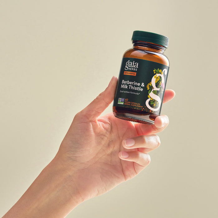 Berberine & Milk Thistle 60 count Bottle Held In A Person's Hand