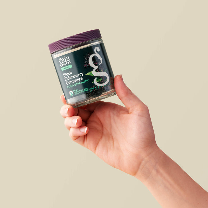 Black Elderberry Gummies Extra Strength 40 count Bottle Held In A Person's Hand