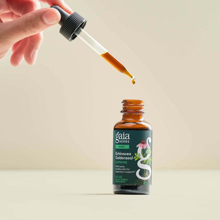 Echinacea Goldenseal Supreme 1 ounce Bottle Held In A Person's Hand