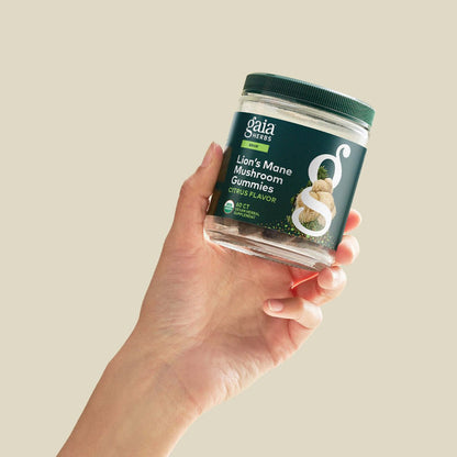 Lion's Mane Mushroom Gummies 60 Count Bottle Held In A Hand